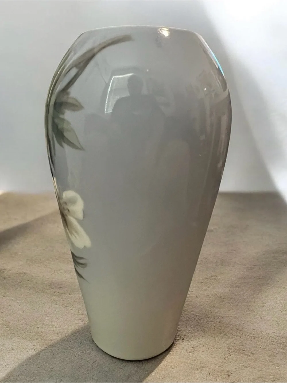 MCM Royal Copenhagen porcelain vase with hand-painted floral motifs.